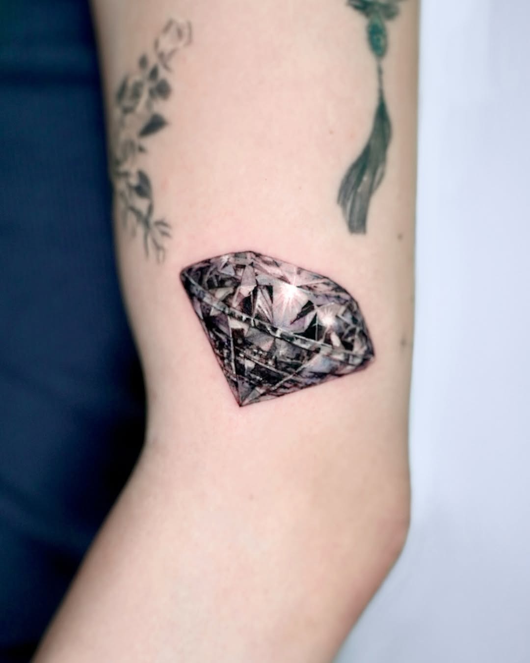Stunning realistic diamond tattoo design on arm Tattoo Design
