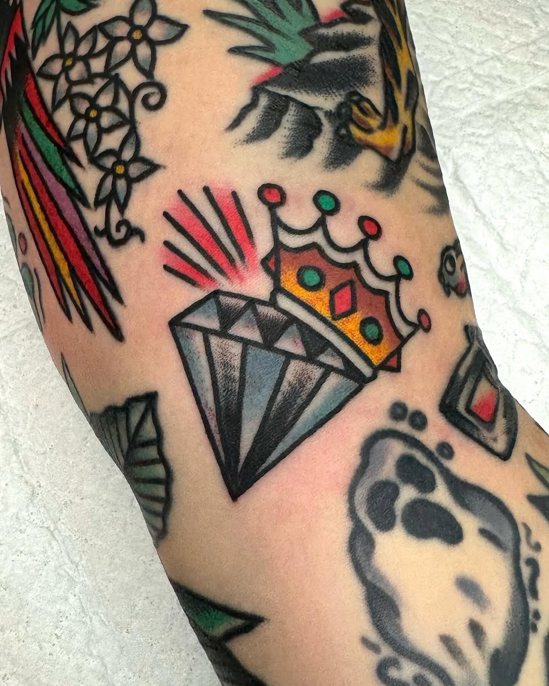 Stylish and bold diamond crown tattoo design Tattoo Design