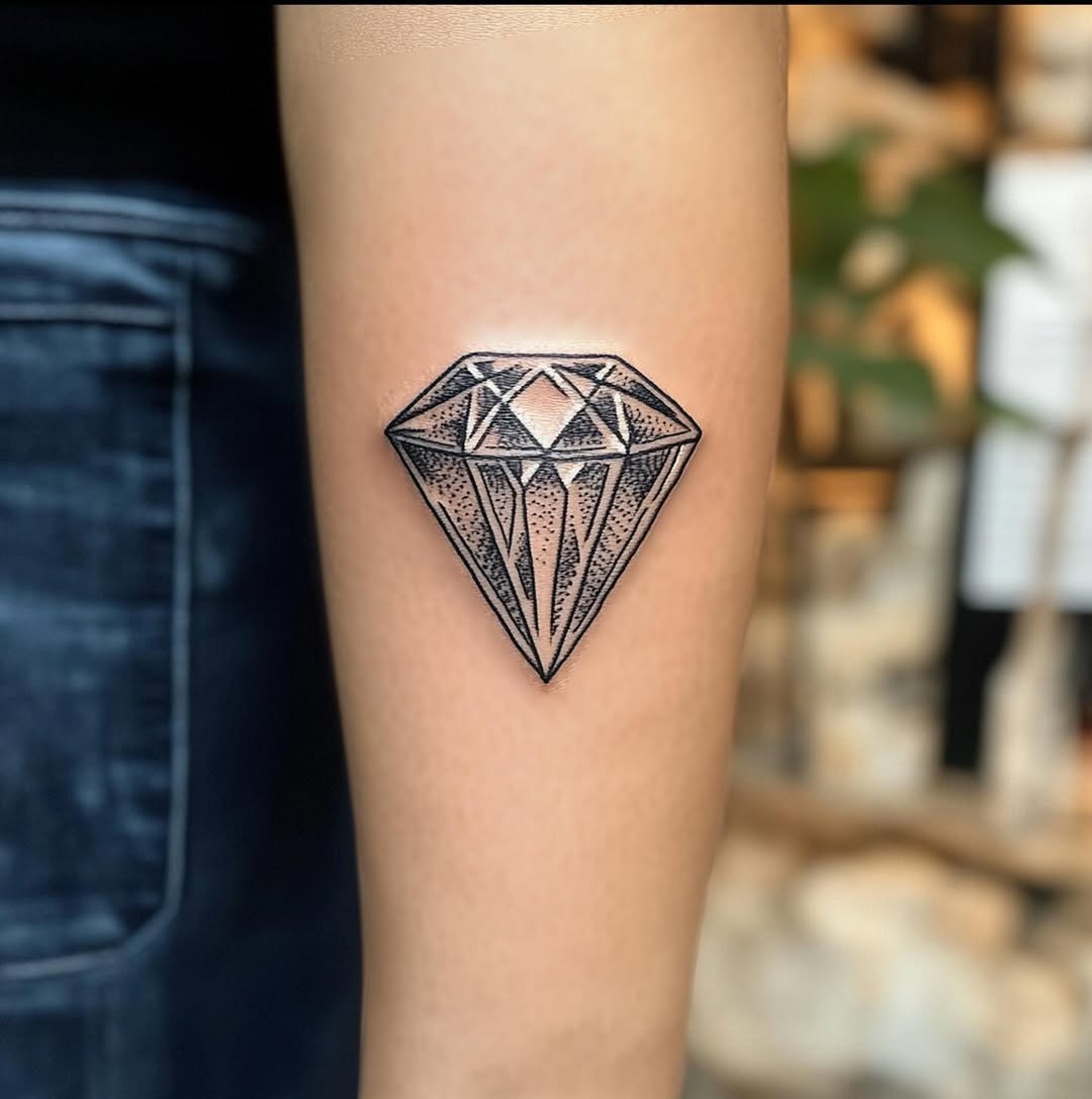 Stylish geometric diamond tattoo on the arm Tattoo Design