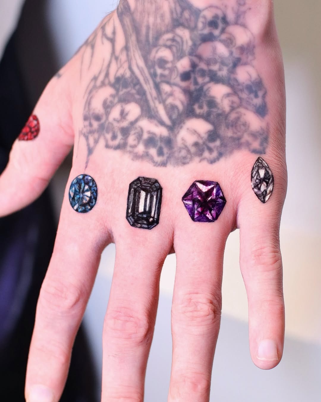 Unique diamond tattoos on an artistic hand Tattoo Design