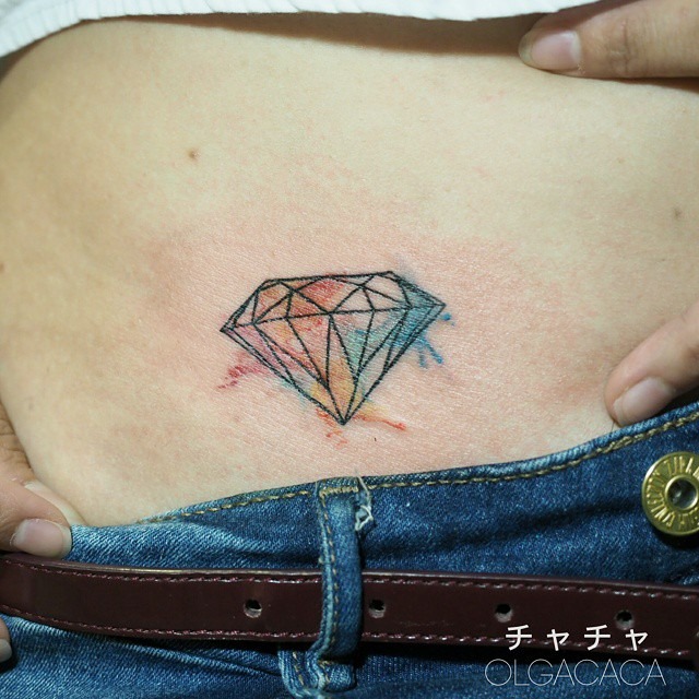 Vibrant diamond tattoo on the belly Tattoo Design