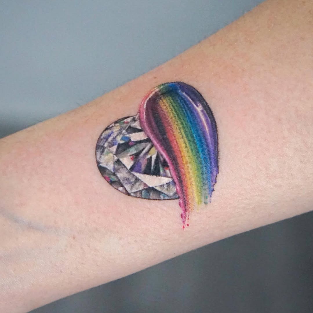 Vivid heart-shaped diamond tattoo with rainbow flair Tattoo Design