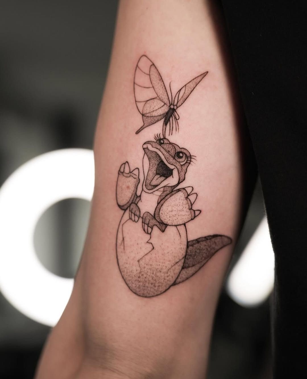 Baby Dinosaur and Butterfly Tattoo Tattoo Design