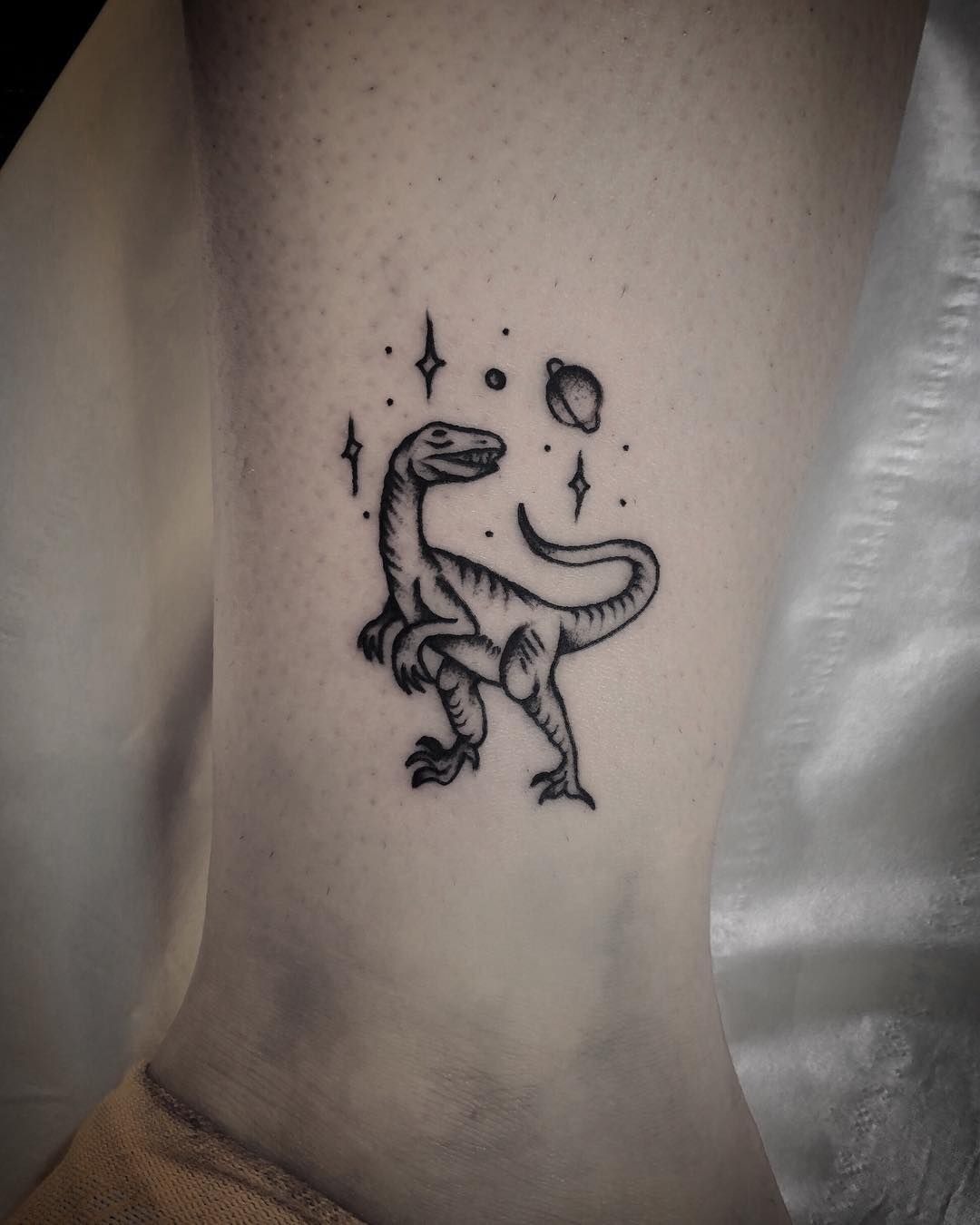 Tiny Raptor in Space Tattoo Tattoo Design