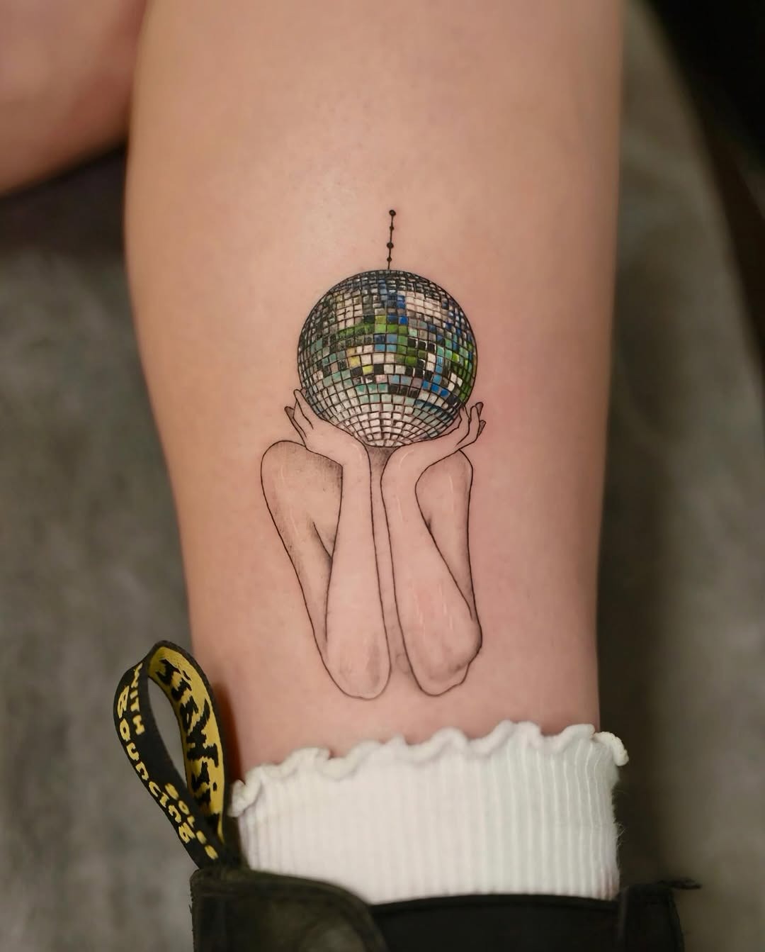 Enchanting disco ball tattoo with elegant design Tattoo Design