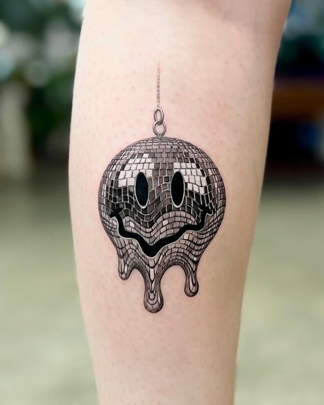 Playful disco ball tattoo with a happy vibe Tattoo Design