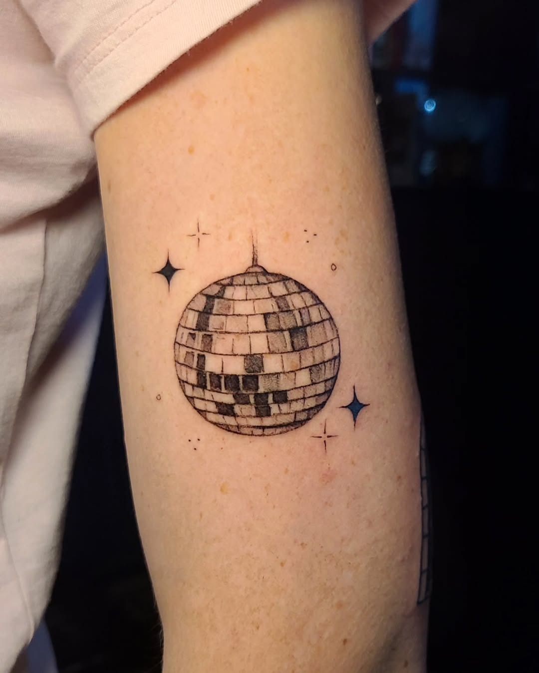 Stylish disco ball tattoo on the arm Tattoo Design