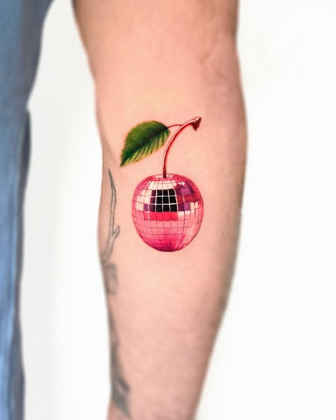 Unique disco ball cherry tattoo design inspiration Tattoo Design