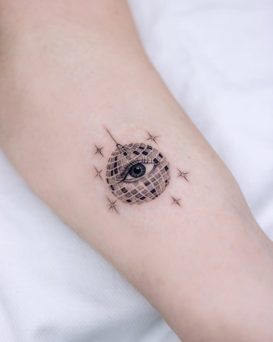 Unique disco ball tattoo with an eye design Tattoo Design