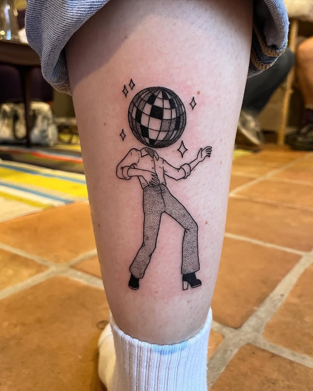 Unique disco ball tattoo with dancing figure Tattoo Design