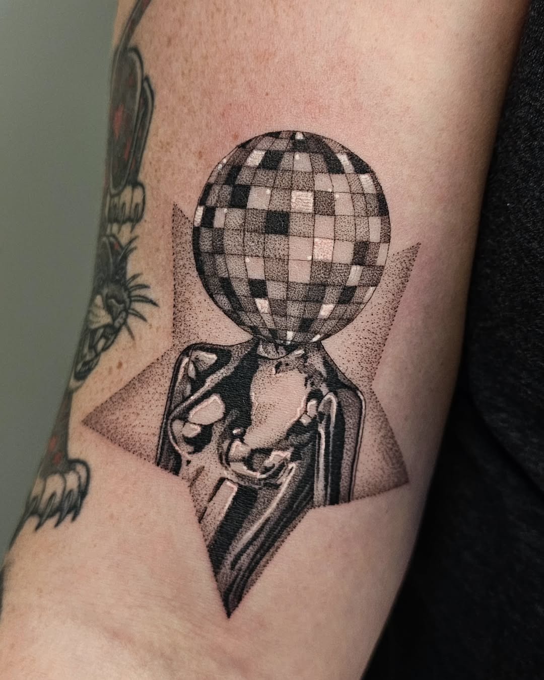 Unique disco ball tattoo with stylish star background Tattoo Design