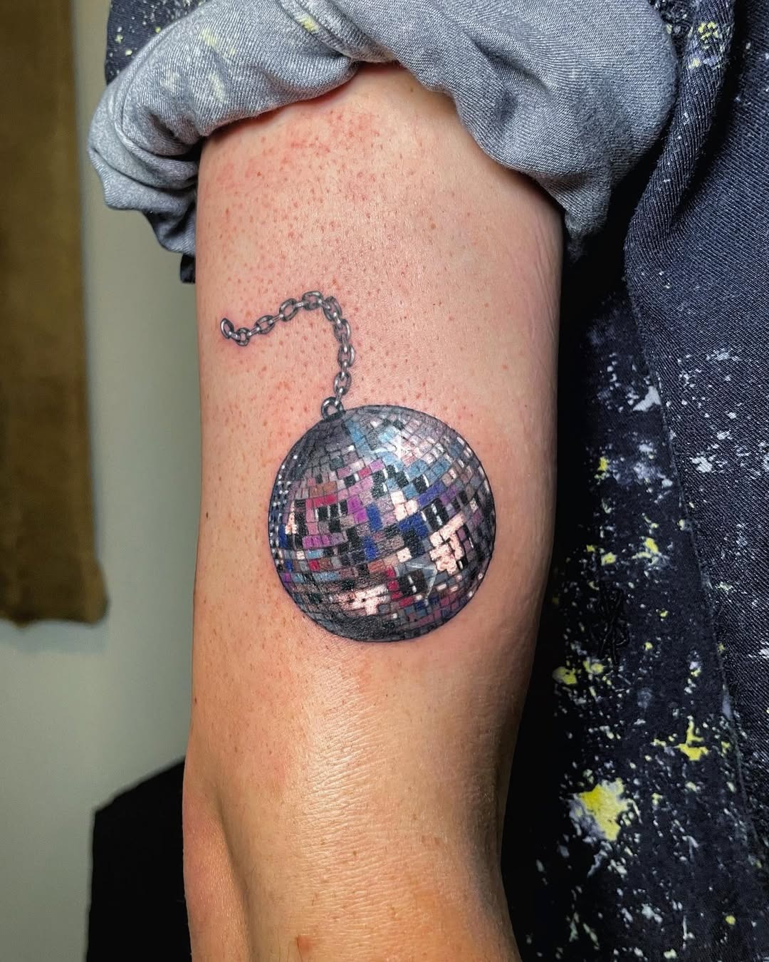 Vibrant disco ball tattoo with stunning details Tattoo Design