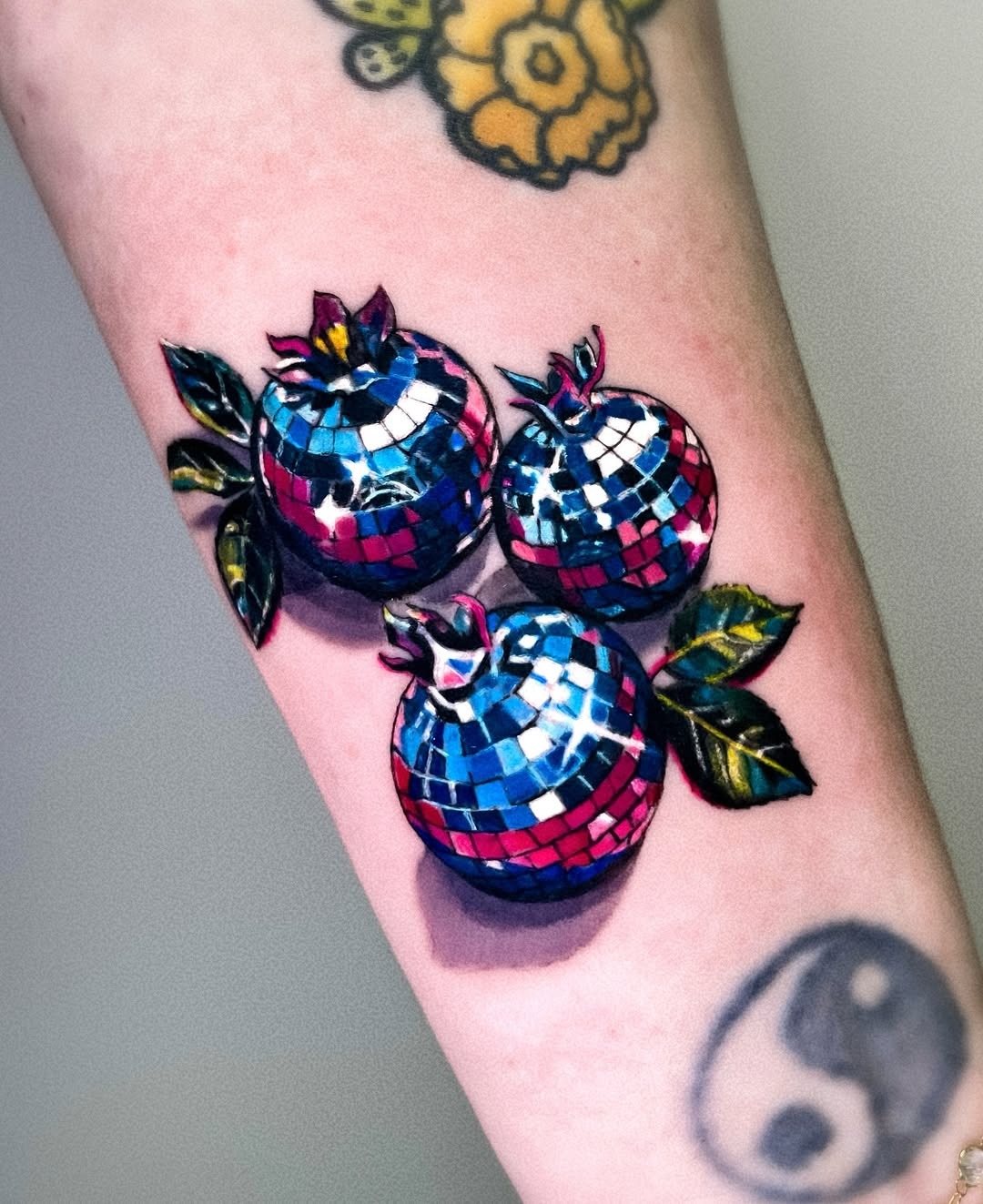 Vivid Disco Ball Tattoos with Floral Elements Tattoo Design