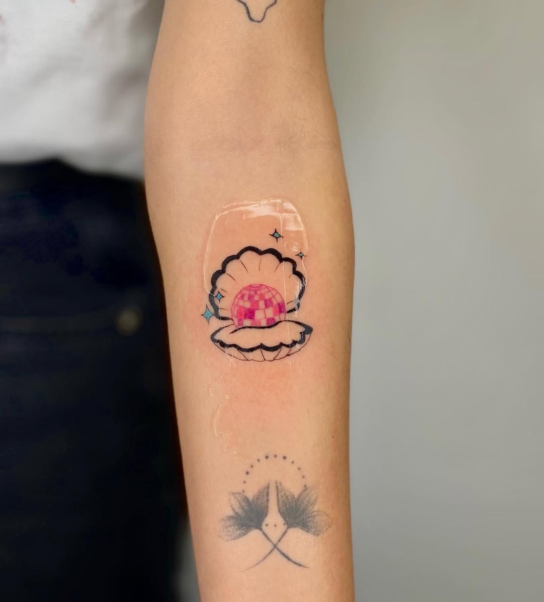 Whimsical clam shell with disco vibes Tattoo Design