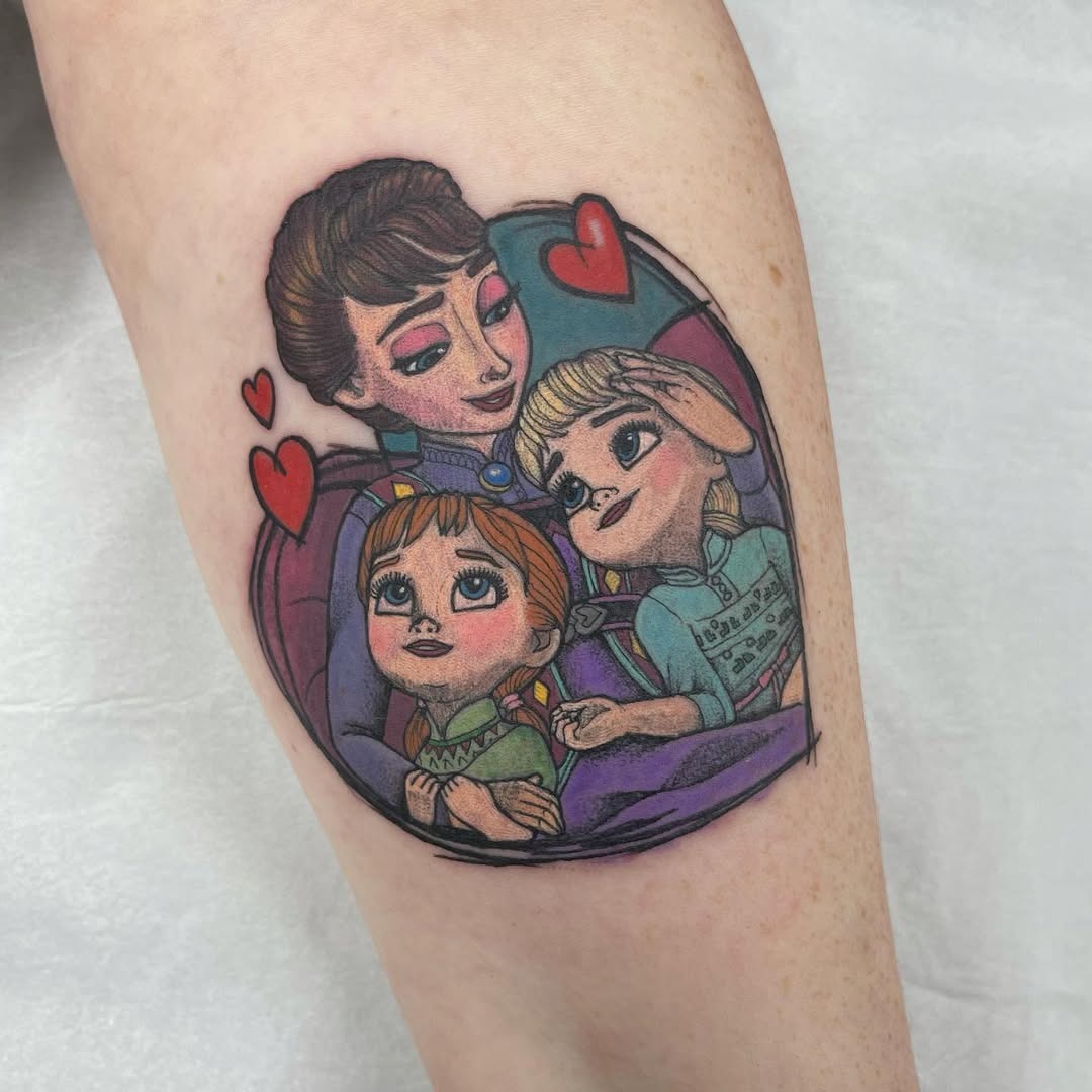 This tattoo features beloved characters Anna and Elsa from Disney's *Frozen*, showing a loving connection between sisters.