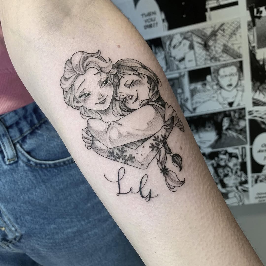 This tattoo showcases a delightful illustration of Elsa and Anna from Disney's Frozen in a warm hug.