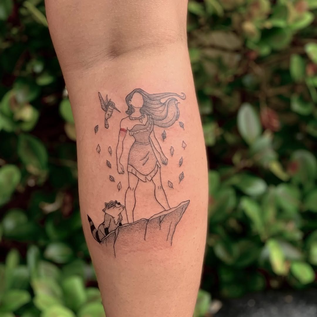 This tattoo features Mulan standing strong, accompanied by a raccoon.