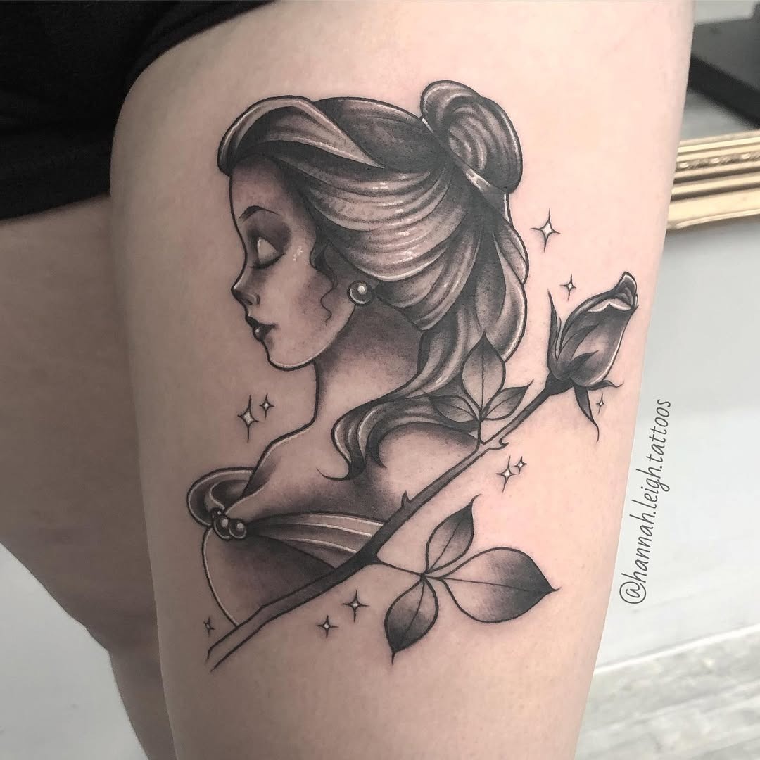 This captivating tattoo features Belle from Disney, elegantly portrayed in grayscale.