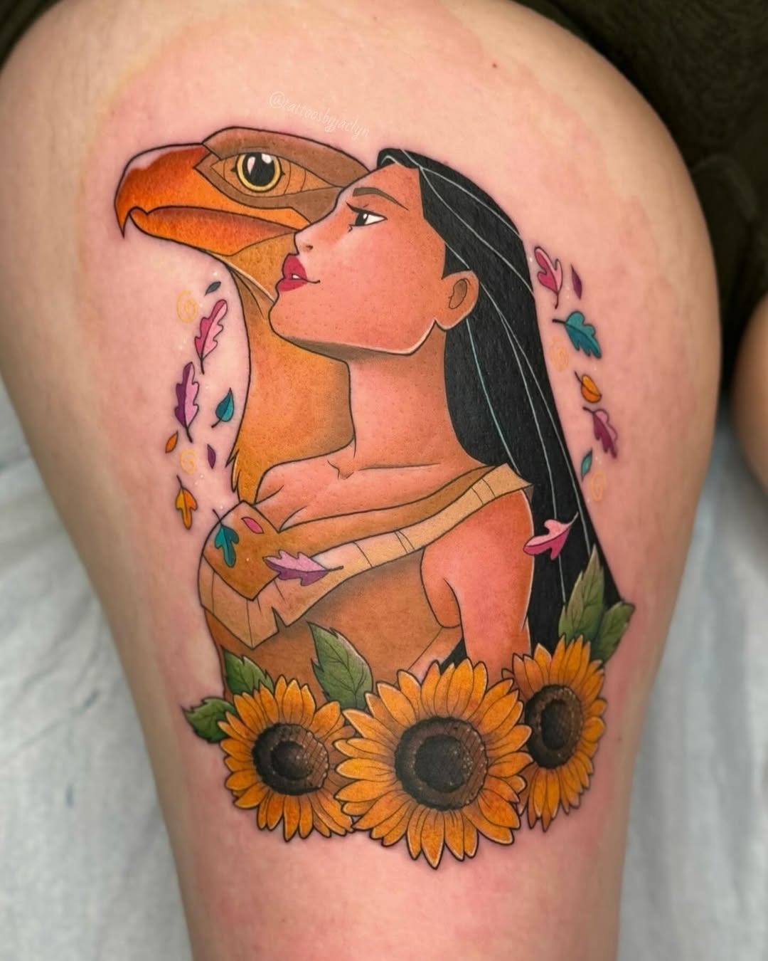 This stunning tattoo showcases Pocahontas in a and colorful style.