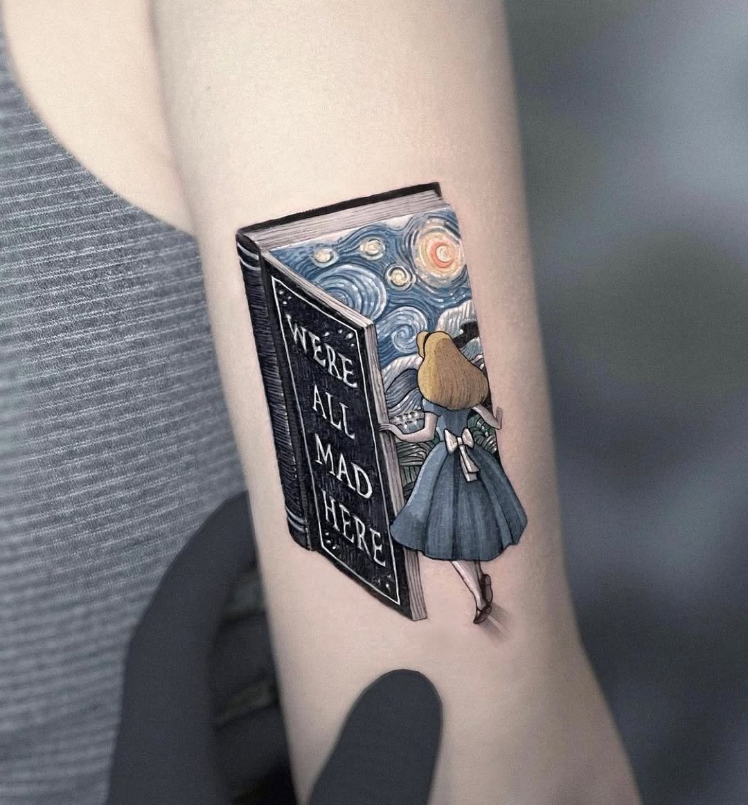 This enchanting tattoo features Alice stepping through an open book, pulling you into the whimsical world of Wonderland.