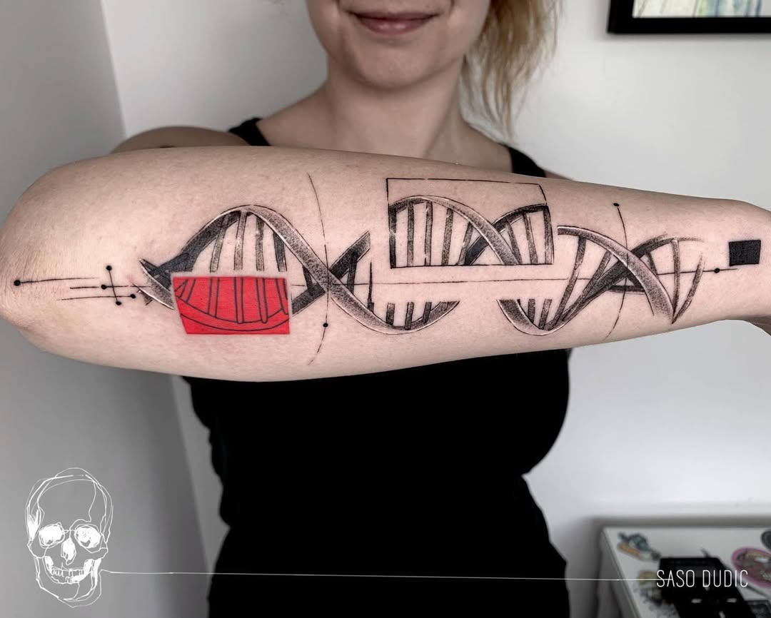 This tattoo features a stylized DNA helix with abstract elements.