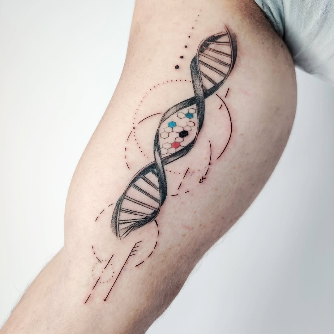 This tattoo showcases a beautifully designed DNA strand, wrapped gracefully around the arm.