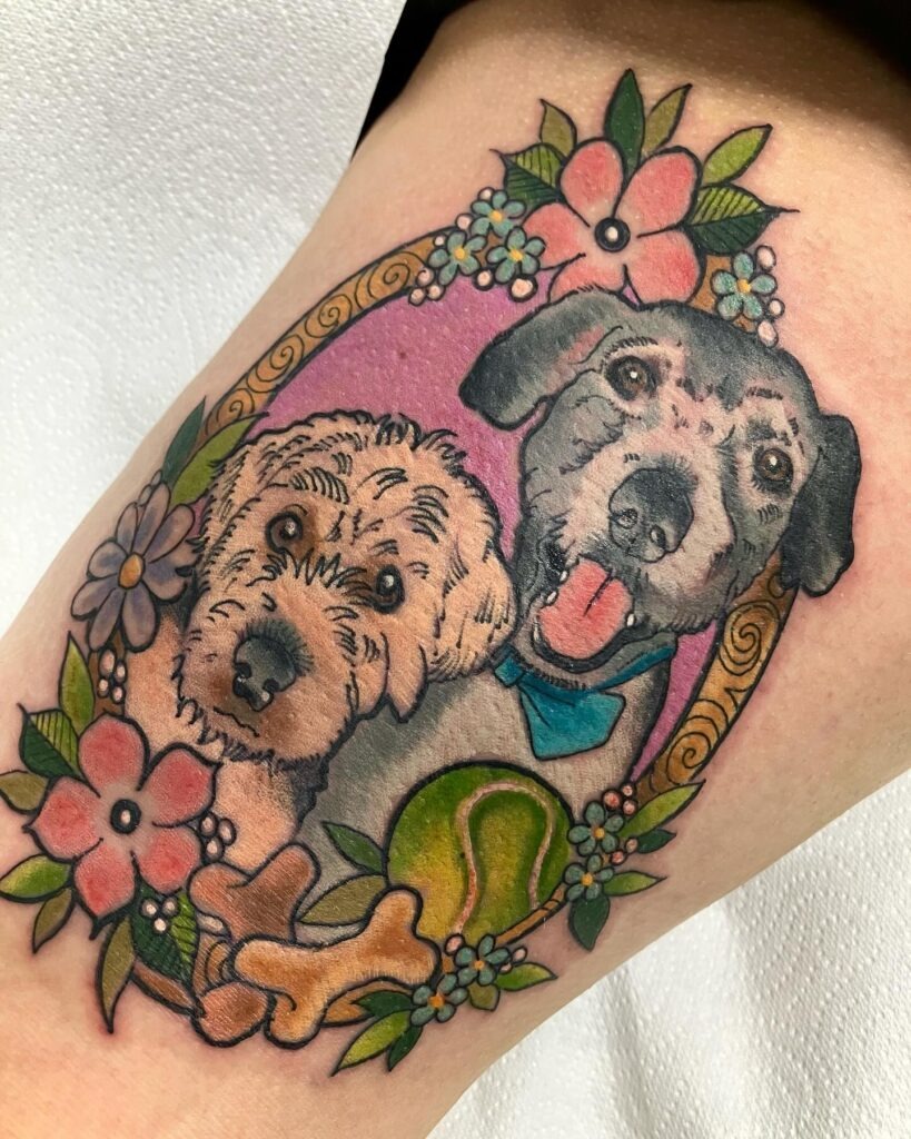 Two Dog Portraits with Floral Frame Tattoo Tattoo Design