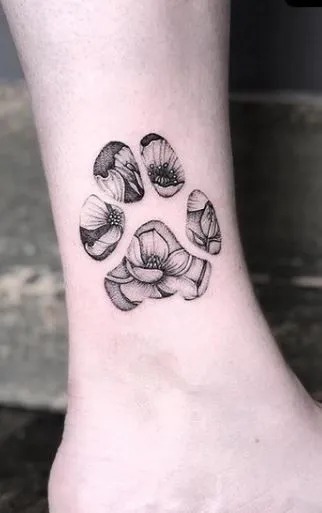 Paw Print with Floral Accents Tattoo Design