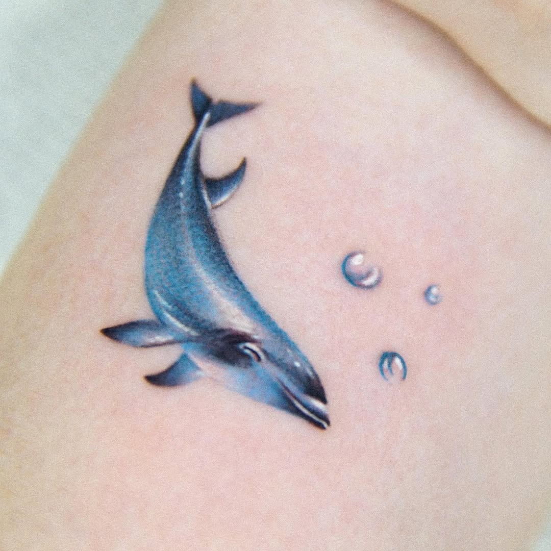 Stunning dolphin tattoo with geometric elements Tattoo Design