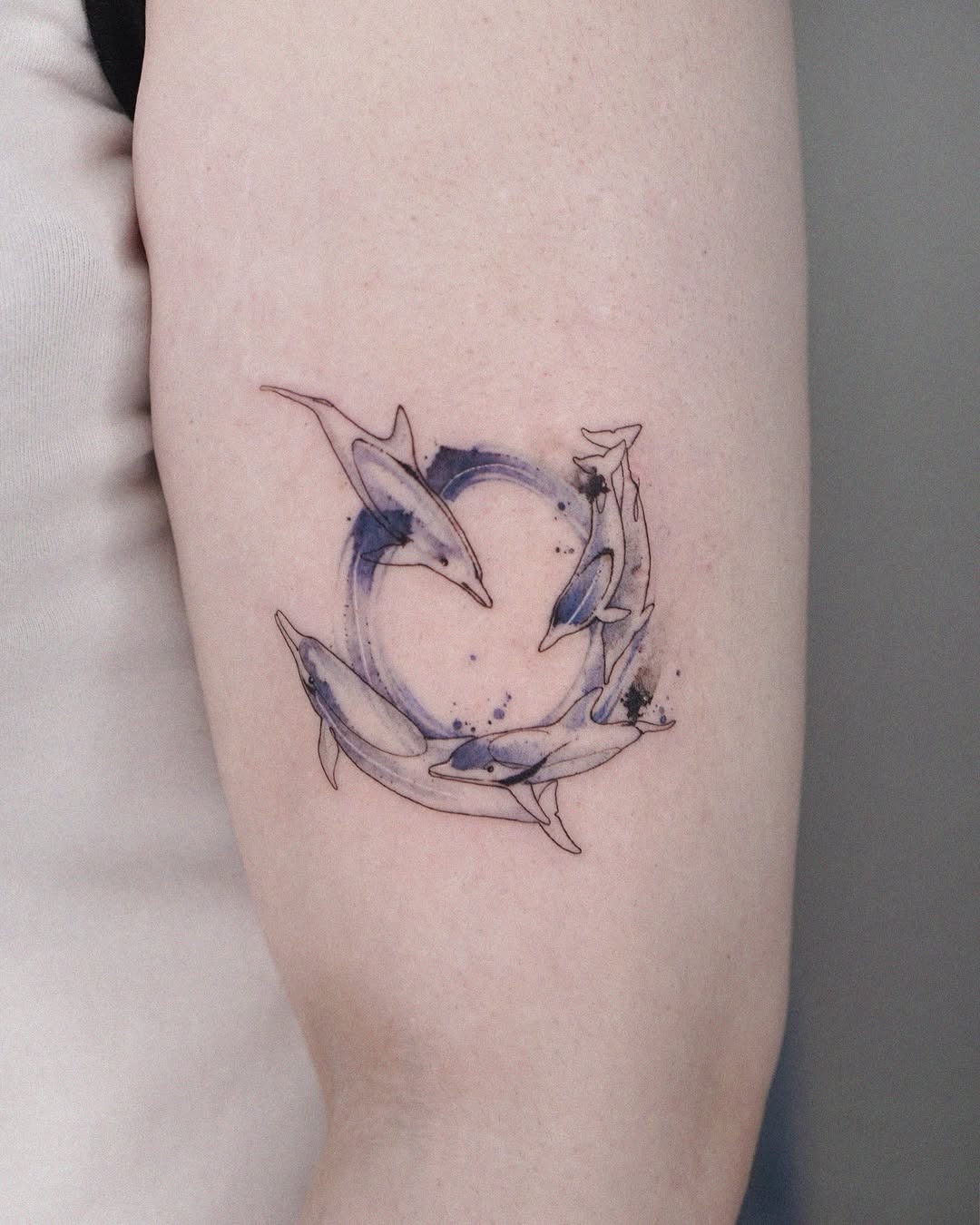 Vibrant dolphin tattoo that captures the ocean Tattoo Design