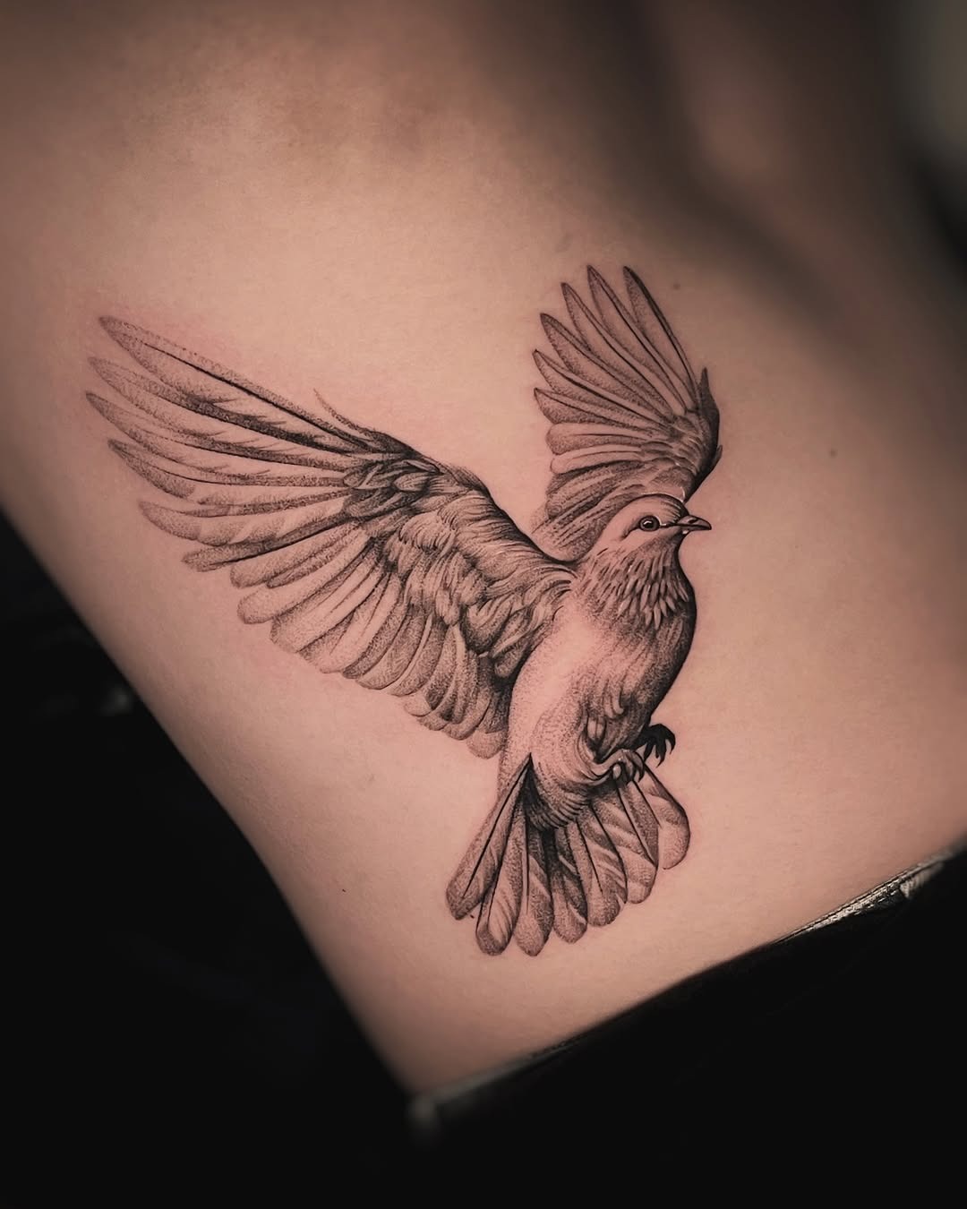 Elegant dove tattoo capturing freedom in flight Tattoo Design