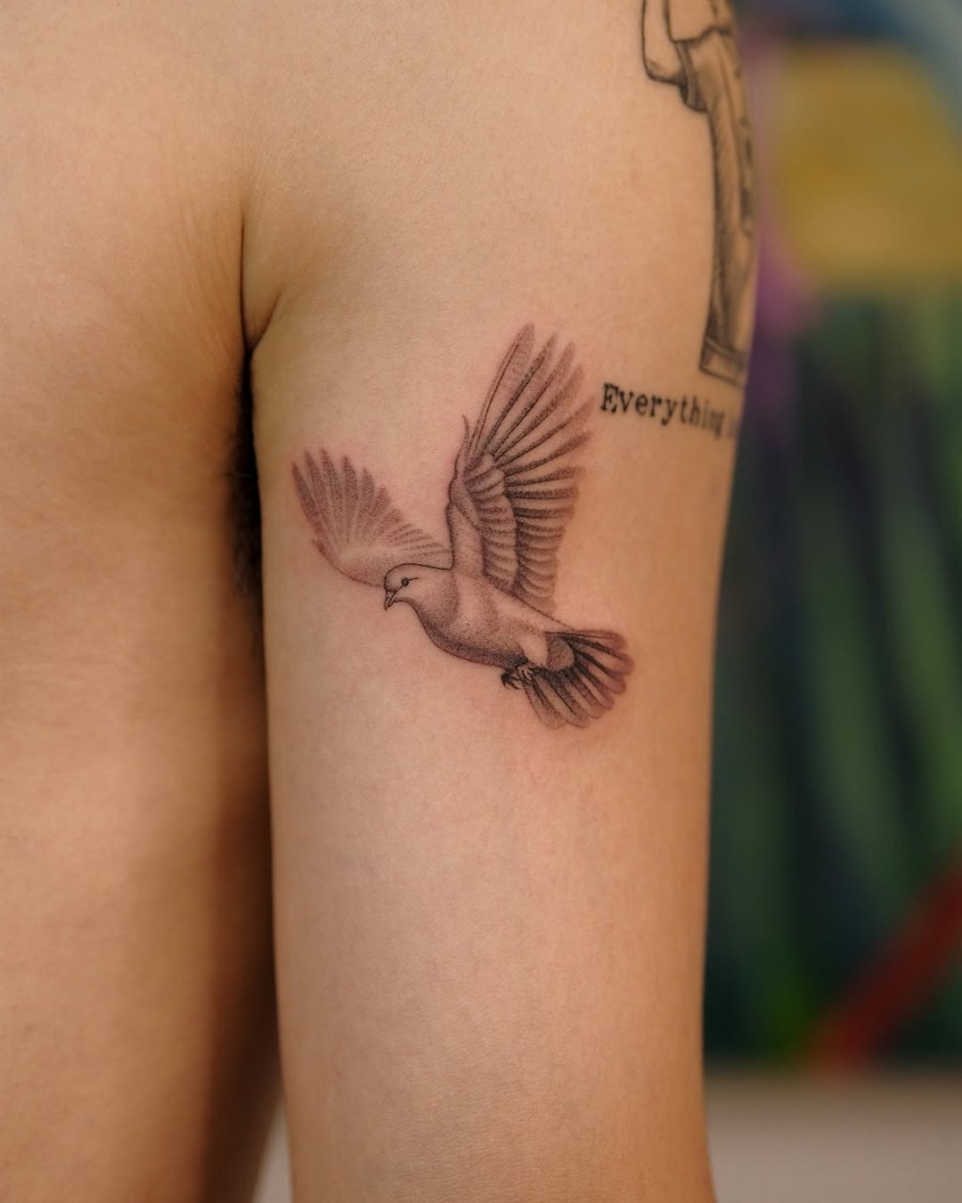 Elegant dove tattoo representing peace and freedom Tattoo Design