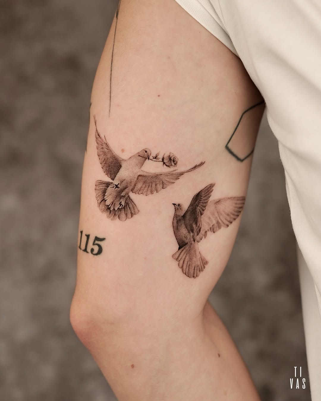 Elegant dove tattoos symbolizing love and peace Tattoo Design