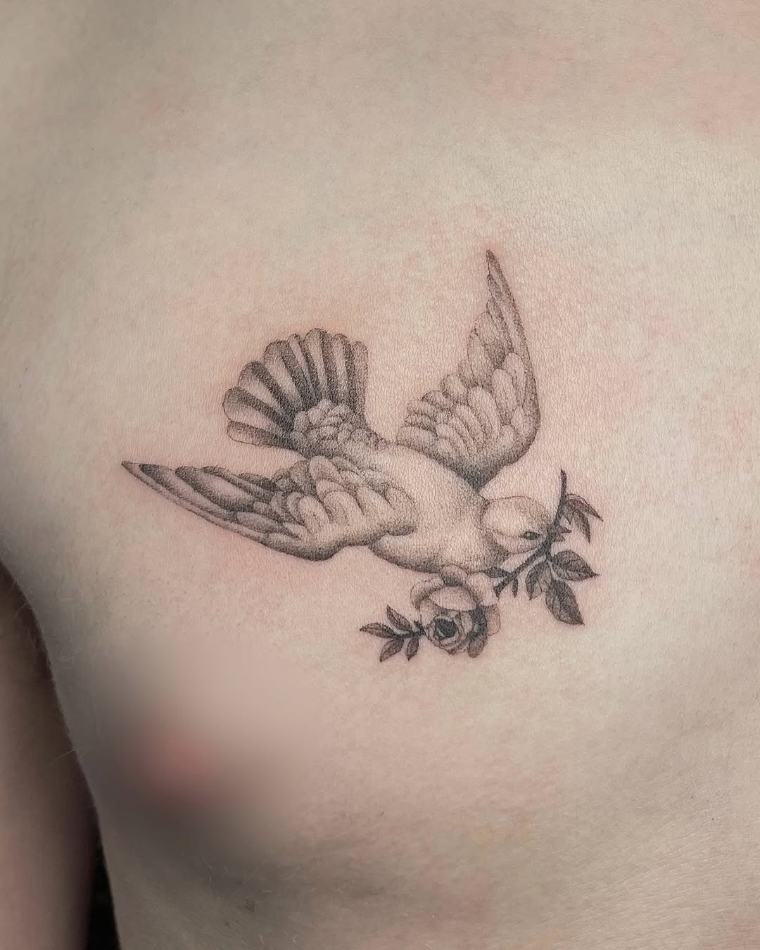 Elegant flying dove with rose branch tattoo Tattoo Design
