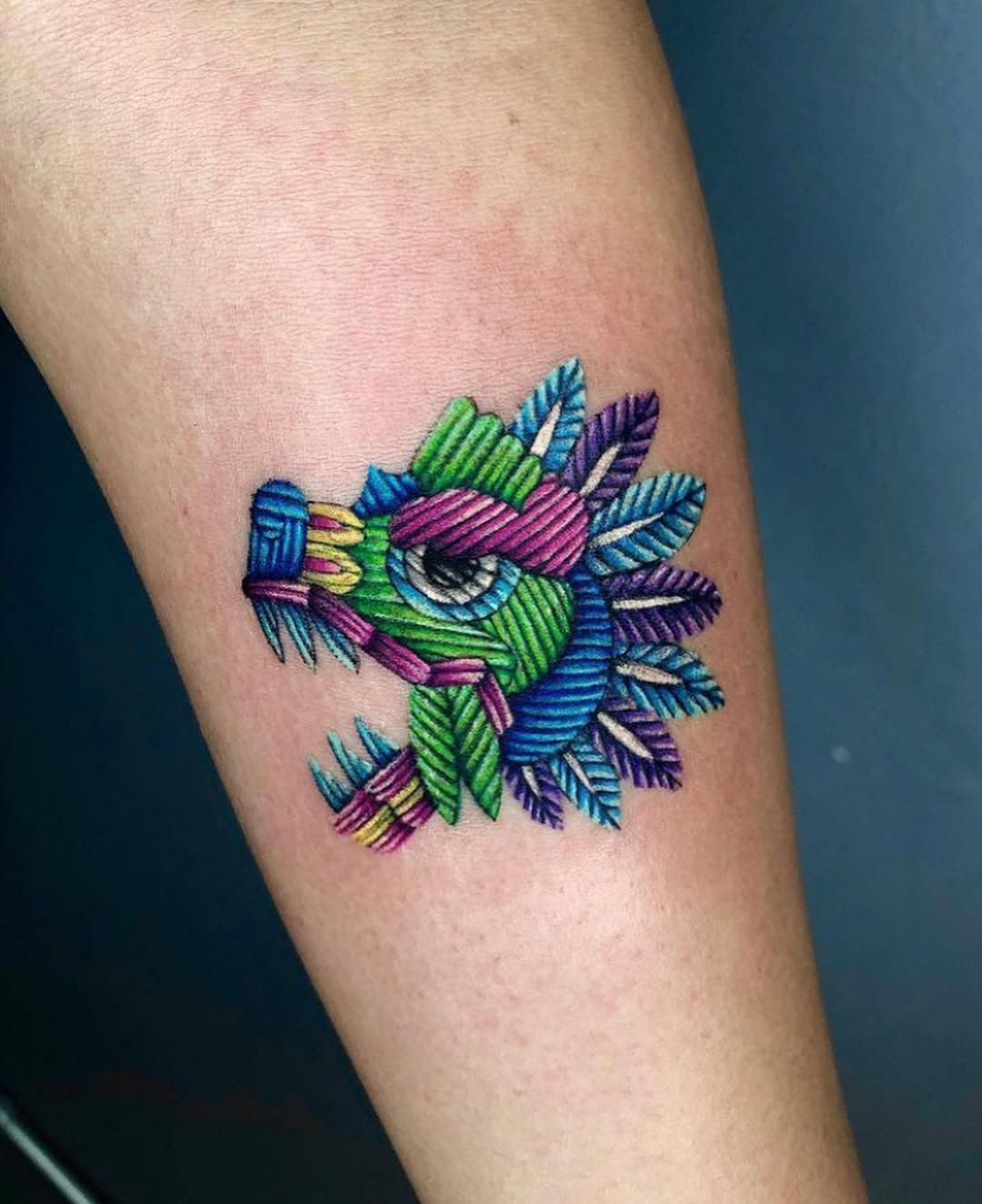 A vibrant dragon tattoo with unique colors. Tattoo Design