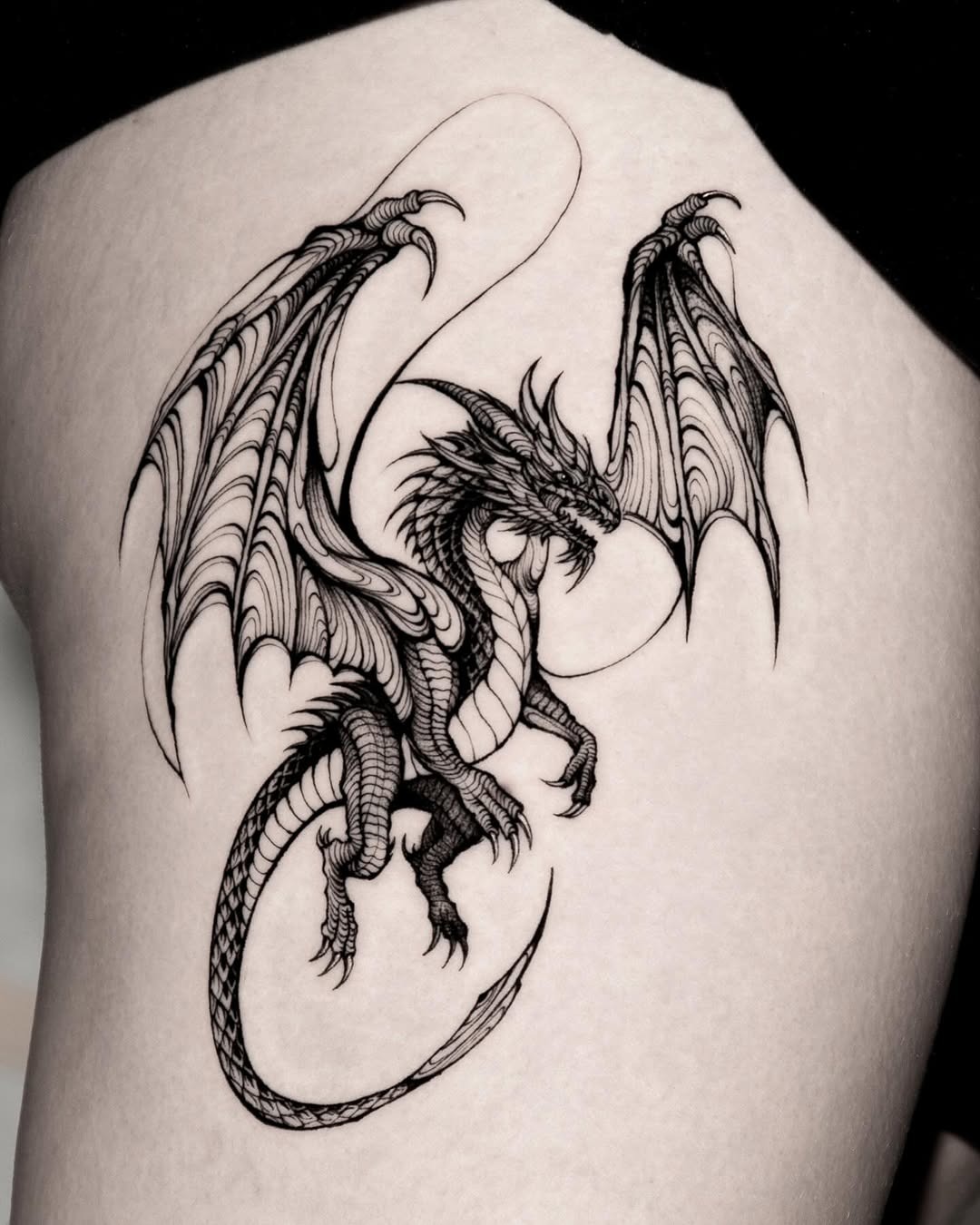Bold black and white dragon tattoo design Tattoo Design