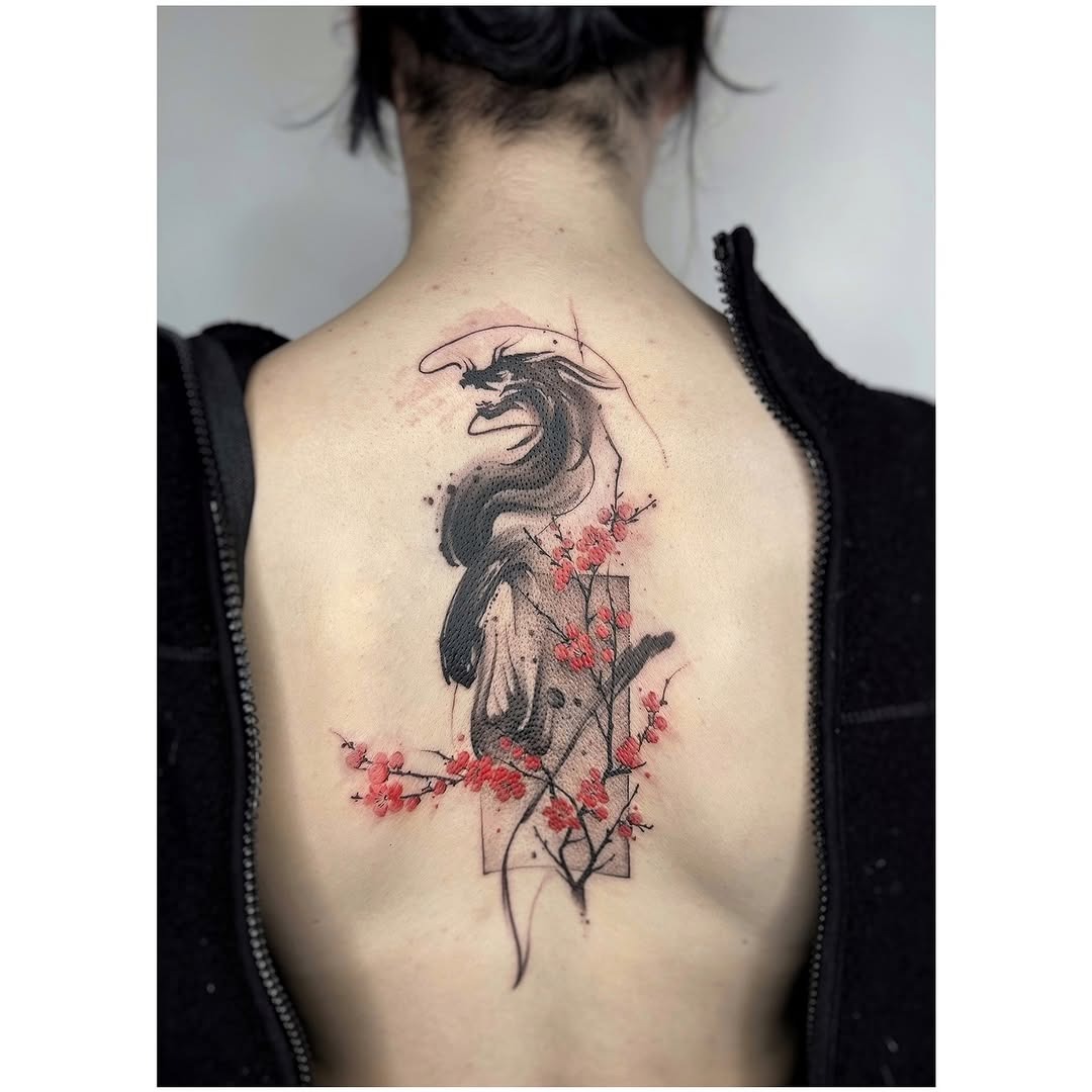 Bold dragon tattoo surrounded by cherry blossoms. Tattoo Design