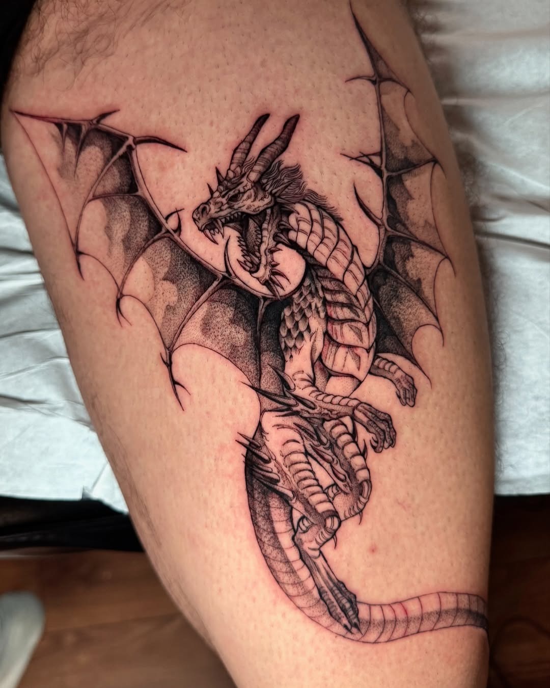 Impressive dragon tattoo showcasing intricate design Tattoo Design