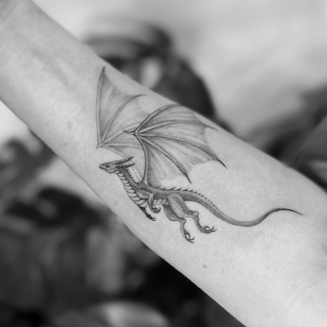Intricate dragon tattoo with majestic wings Tattoo Design