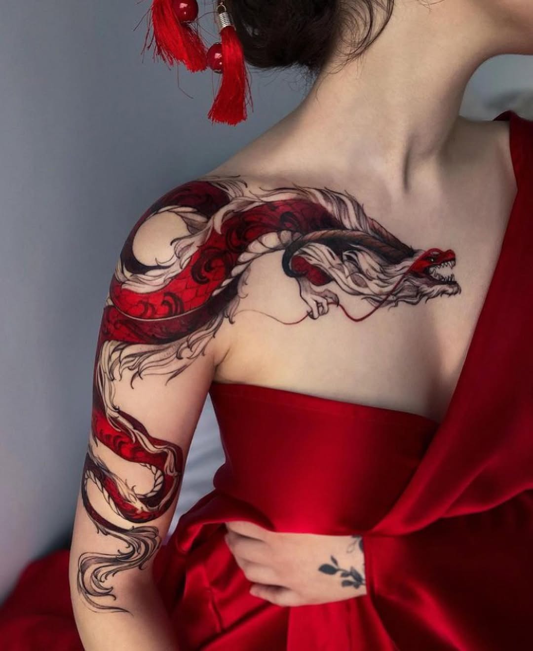 Intricate red and black dragon tattoo design Tattoo Design