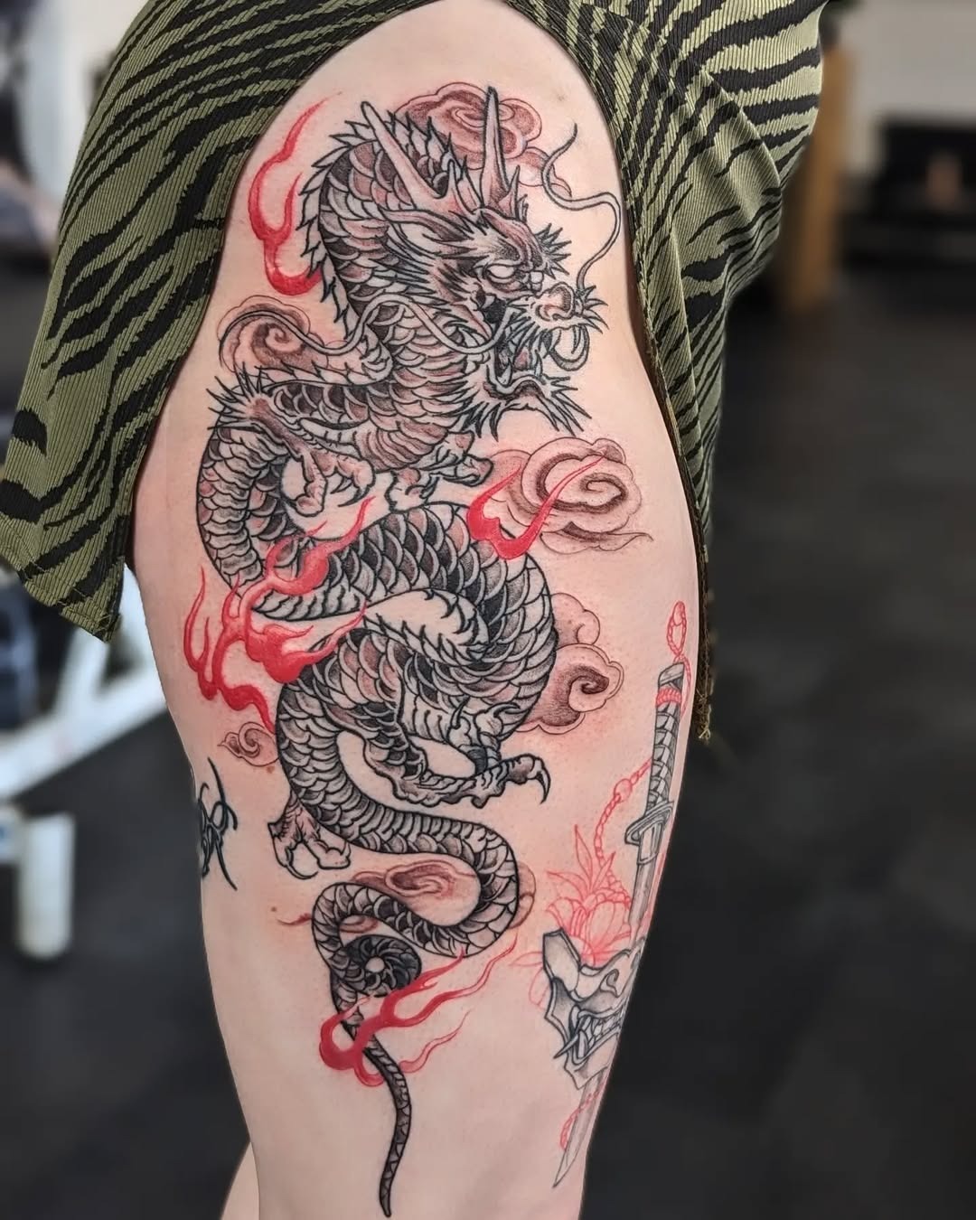 Stunning dragon tattoo showcasing fierce details Tattoo Design