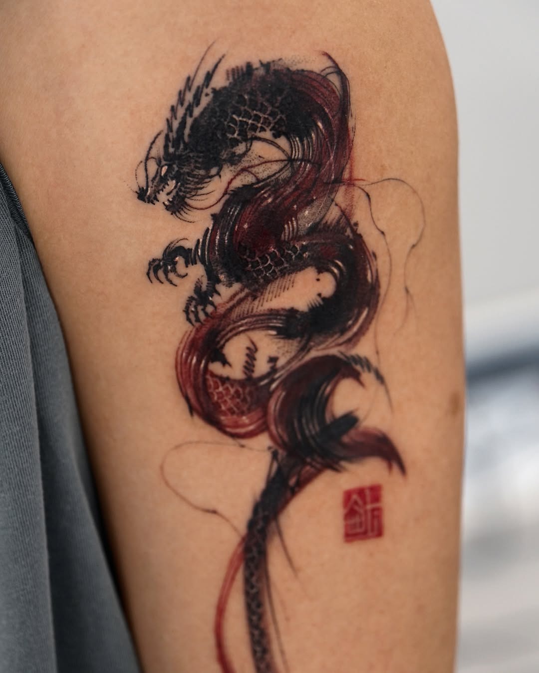 Stunning Dragon Tattoo with Artistic Flair Tattoo Design