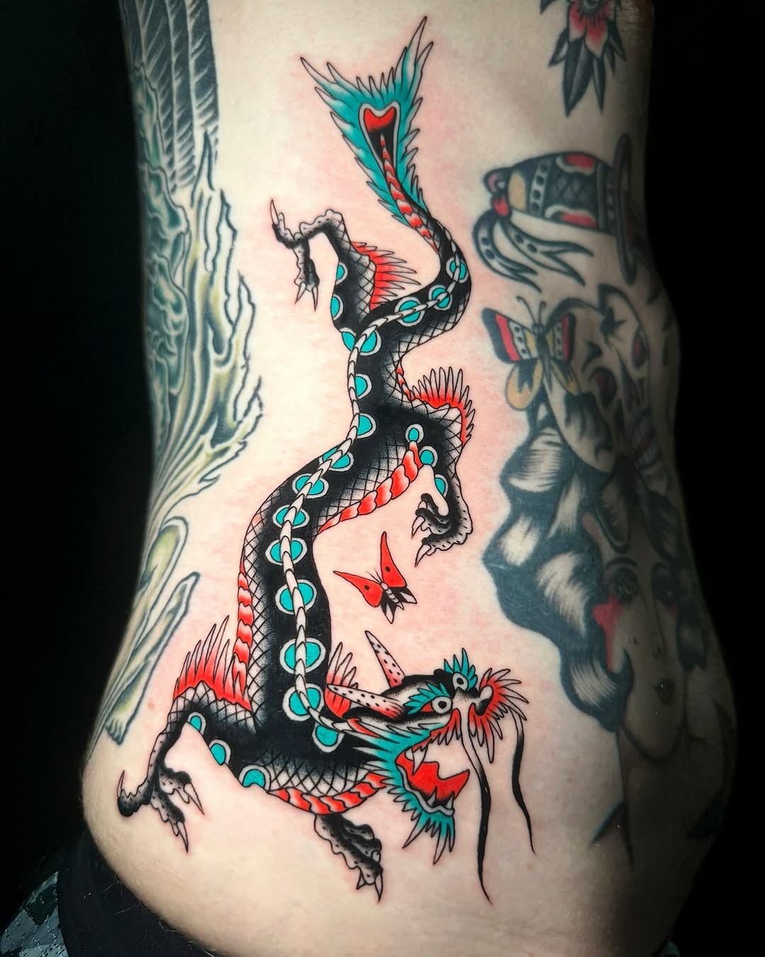 Stunning dragon tattoo with dynamic colors Tattoo Design