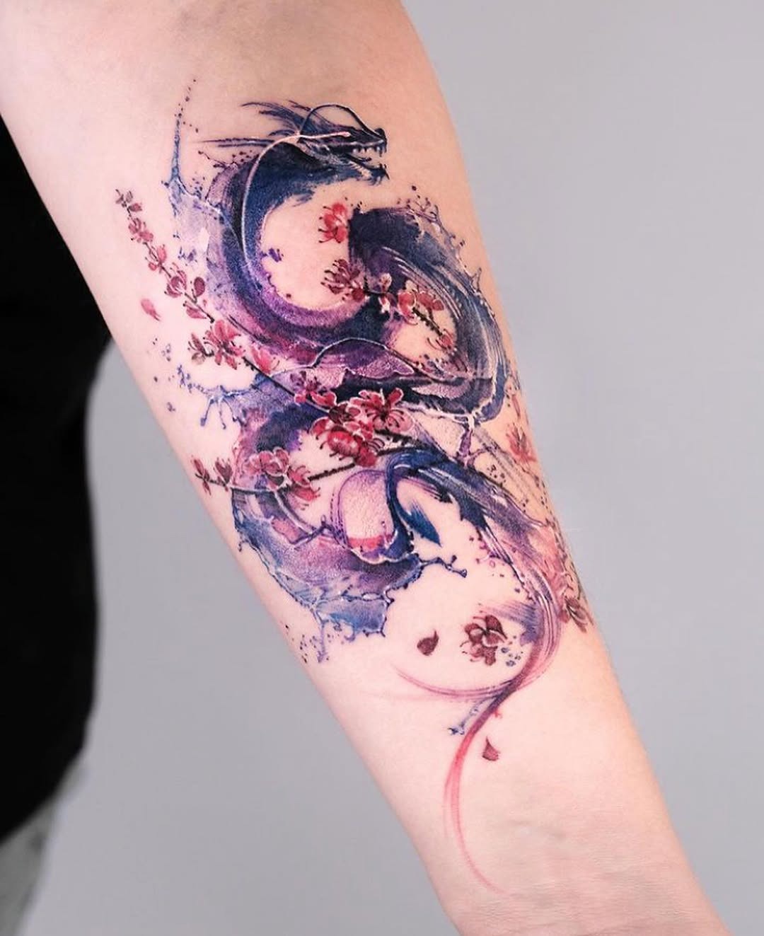 Stunning dragon tattoo with floral elements Tattoo Design