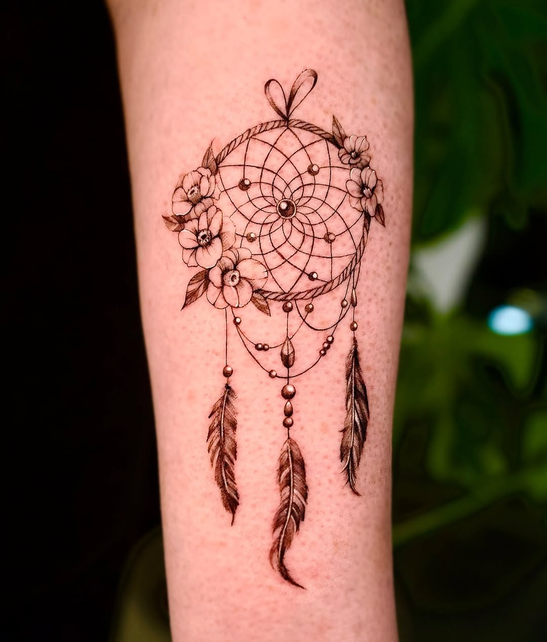 Elegant floral dreamcatcher tattoo design Tattoo Design