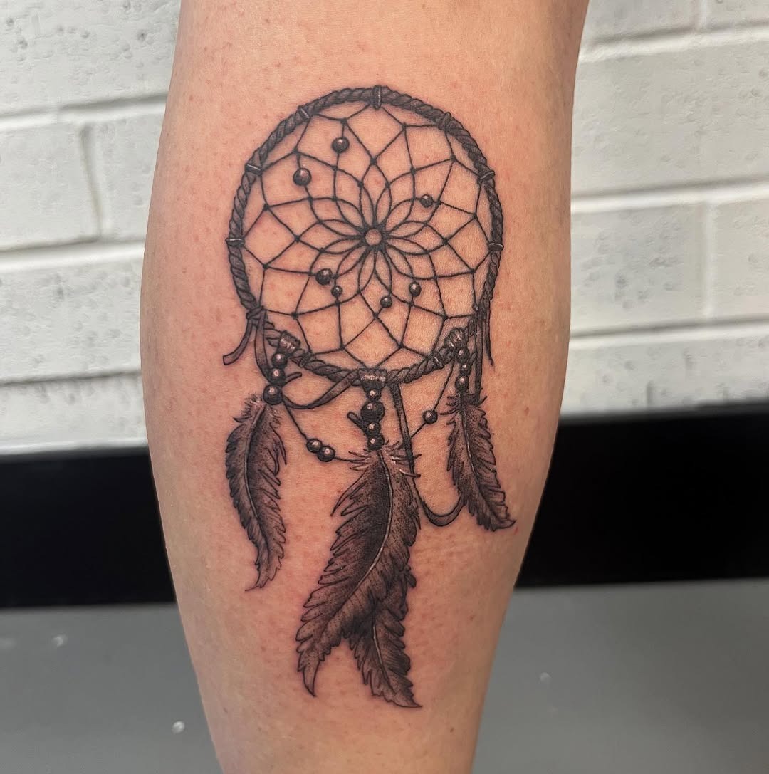Intricate black ink dreamcatcher tattoo design Tattoo Design