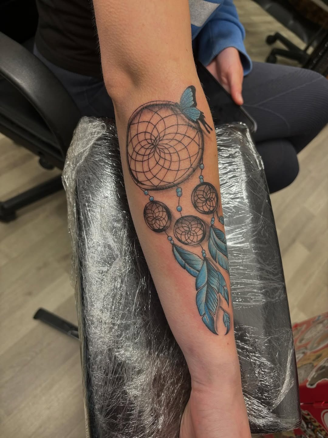 Vibrant dreamcatcher tattoo with feathers Tattoo Design
