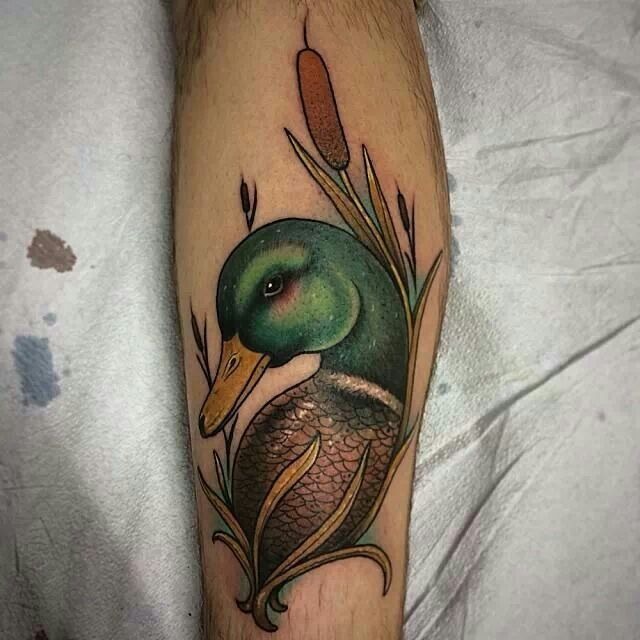 Nature-Inspired Mallard with Reeds Tattoo Design