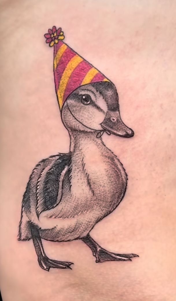 Realistic Duckling with Party Hat Tattoo Design