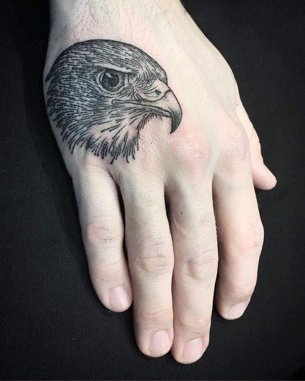 Sketch-Style Eagle on Hand Tattoo Design